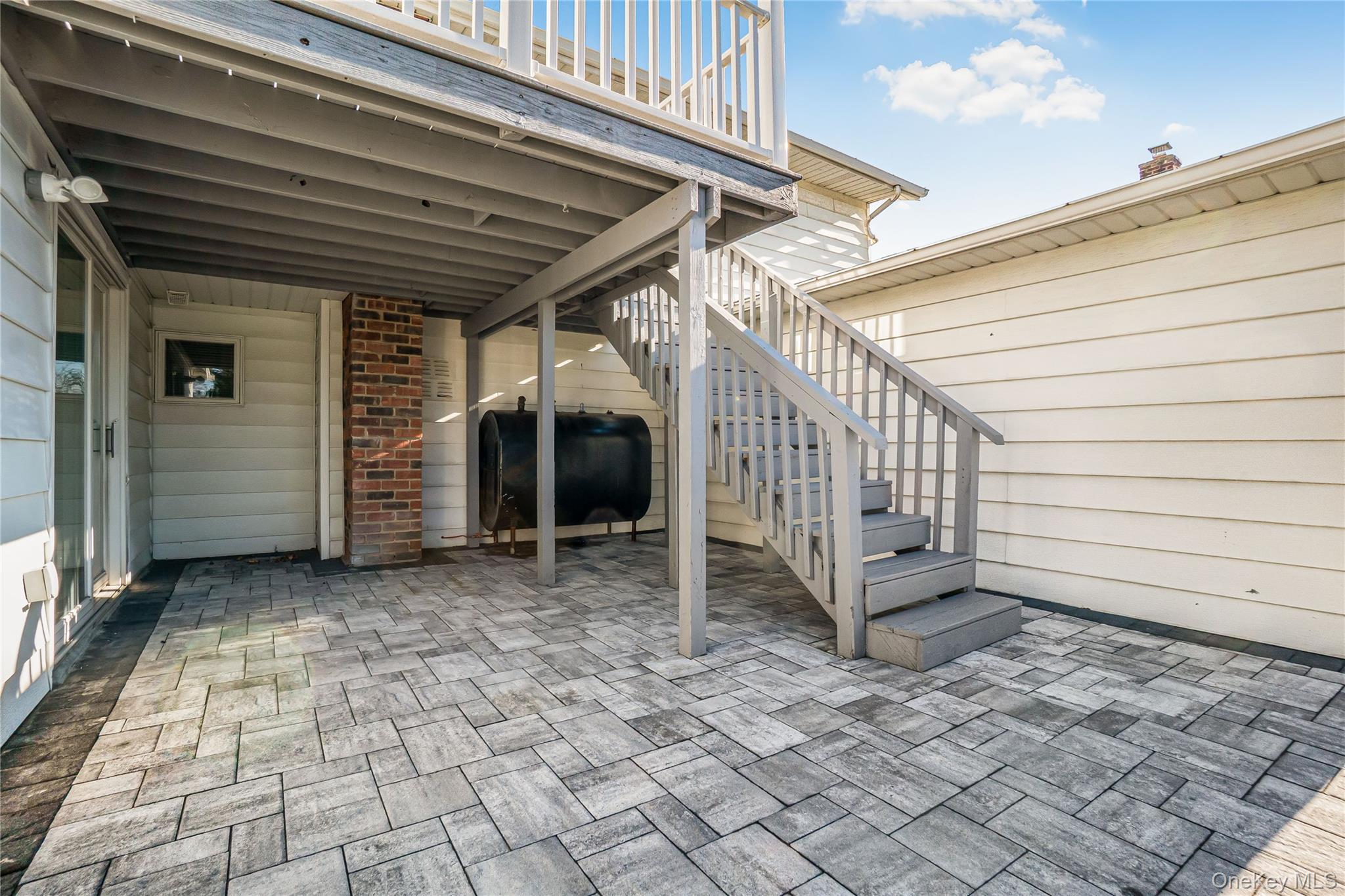 107 Beverly Road Massapequa, NY 11758 - Photo 21 of 30 a view of a house with a yard