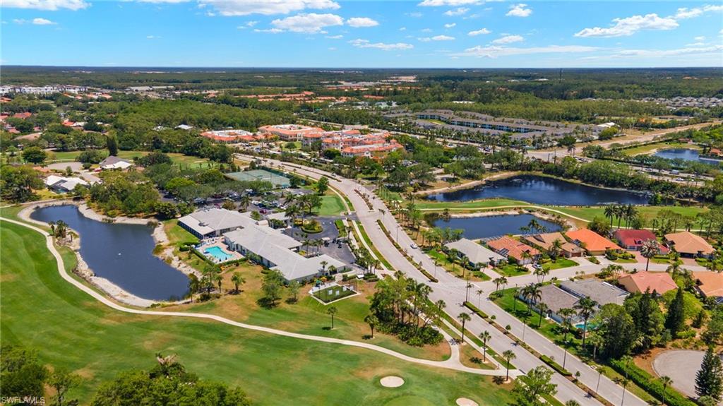 1409 Athol Way, Unit 101 Naples, FL 34104 - Photo 31 of 37 Birds eye view of property with a water view, golf course view, and a residential view