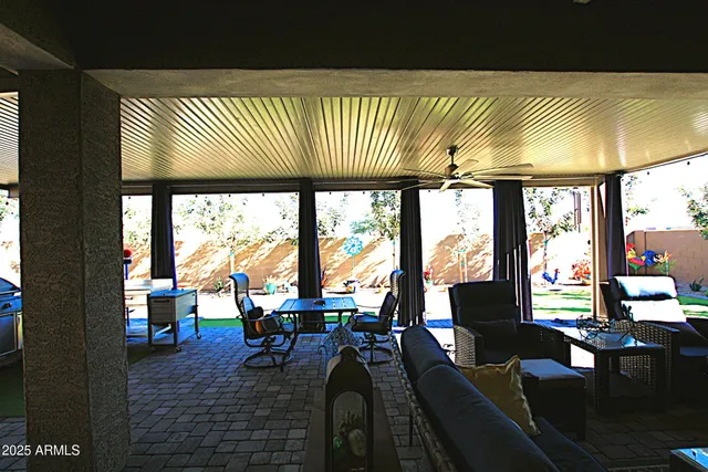 a room with furniture and a flat screen tv