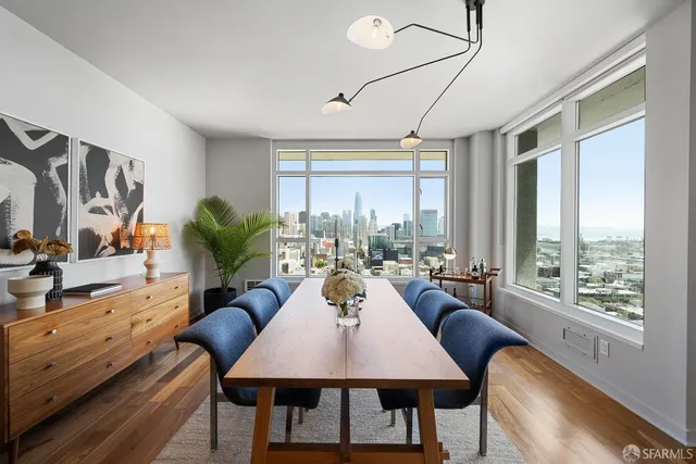 a view of a dining room with furniture window and outside view