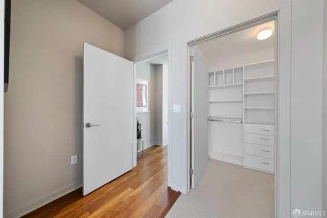 a view of a hallway with closet