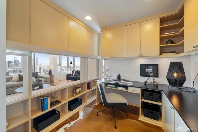 a kitchen with stainless steel appliances kitchen island granite countertop a sink and cabinets