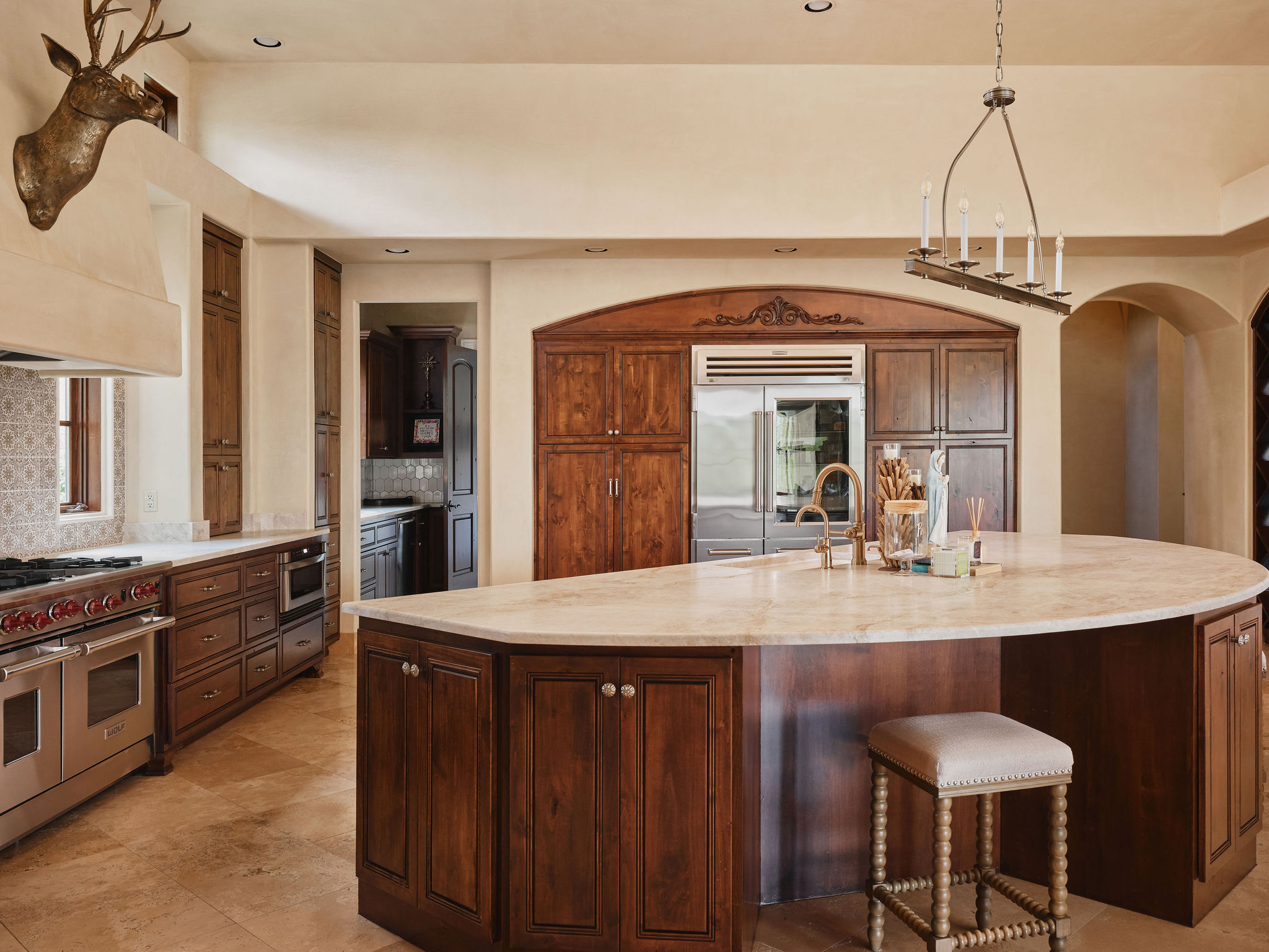 433 Brandon Way Austin, TX 78733 - Photo 9 of 40 Culinary excellence awaits in this kitchen, boasting professional-grade stainless steel appliances and abundant cabinetry.