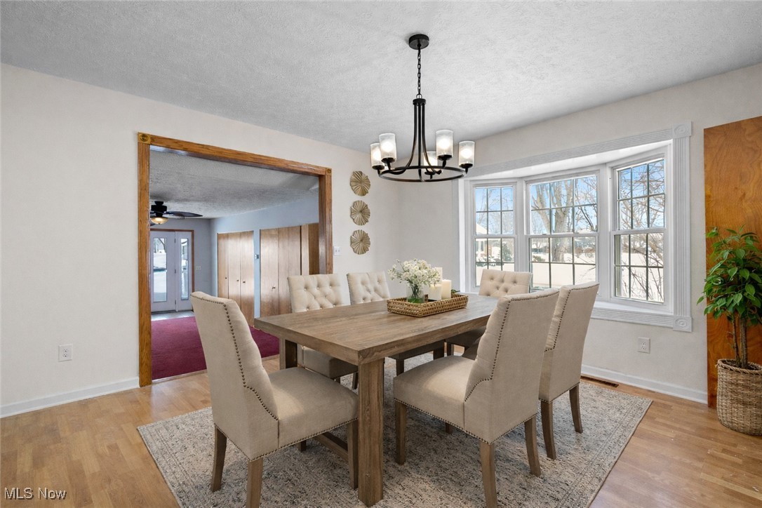 14015 West Lake Road Vermilion, OH 44089 - Photo 4 of 50 Virtually staged Dining Room