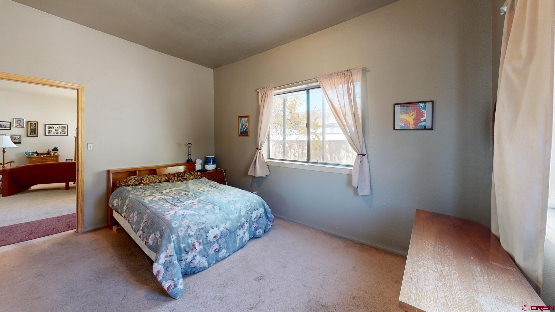 1449 Florida Road Durango, CO 81301 - Photo 20 of 35 a bedroom with a bed and a window