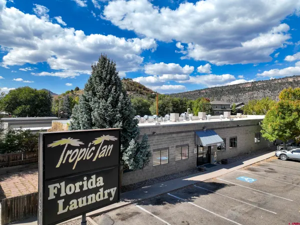a view of a kitchen with washer and dryer