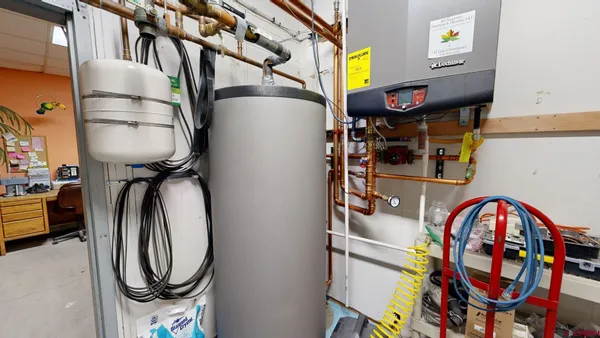 a view of washer and dryer in a utility room