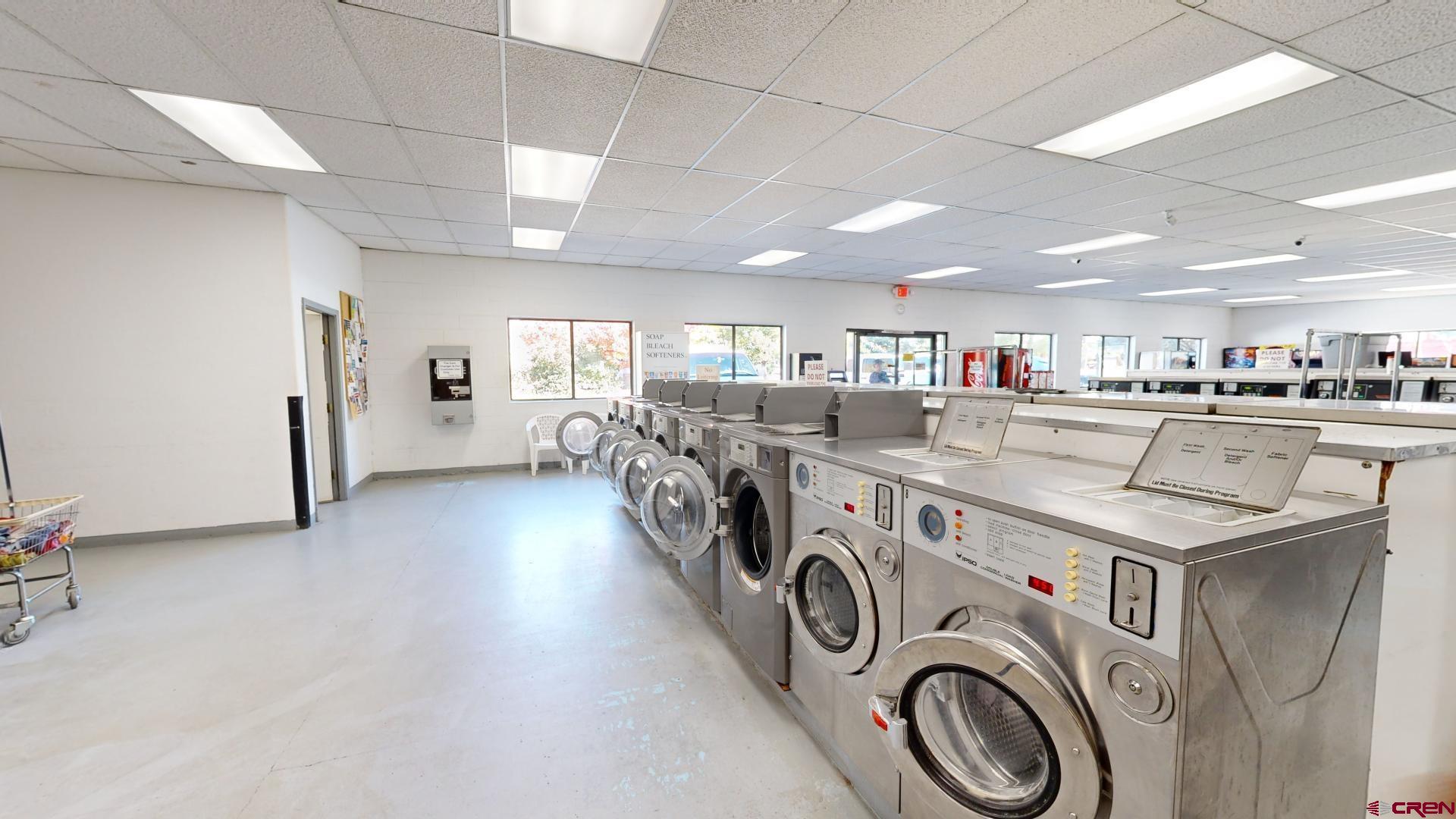 1449 Florida Road Durango, CO 81301 - Photo 8 of 35 a view of a storage & utility room with washer and dryer