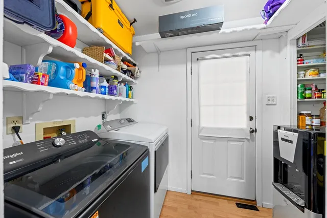 a view of an empty room with furniture and toys
