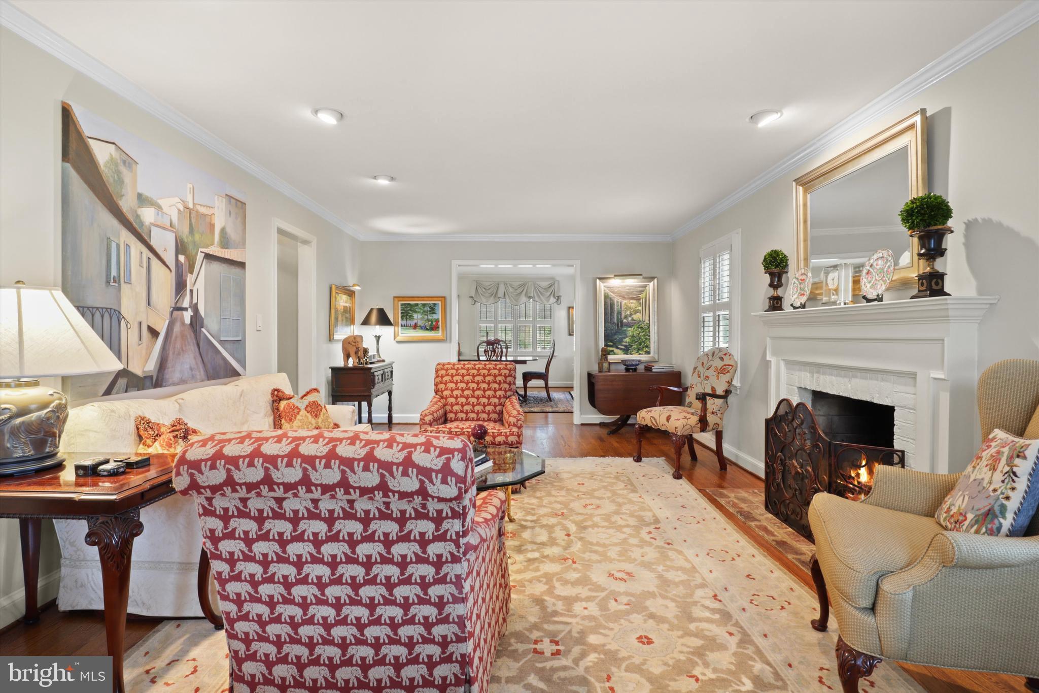 2905 Dartmouth Road Alexandria, VA 22314 - Photo 11 of 28 a living room with furniture a fireplace and a flat screen tv