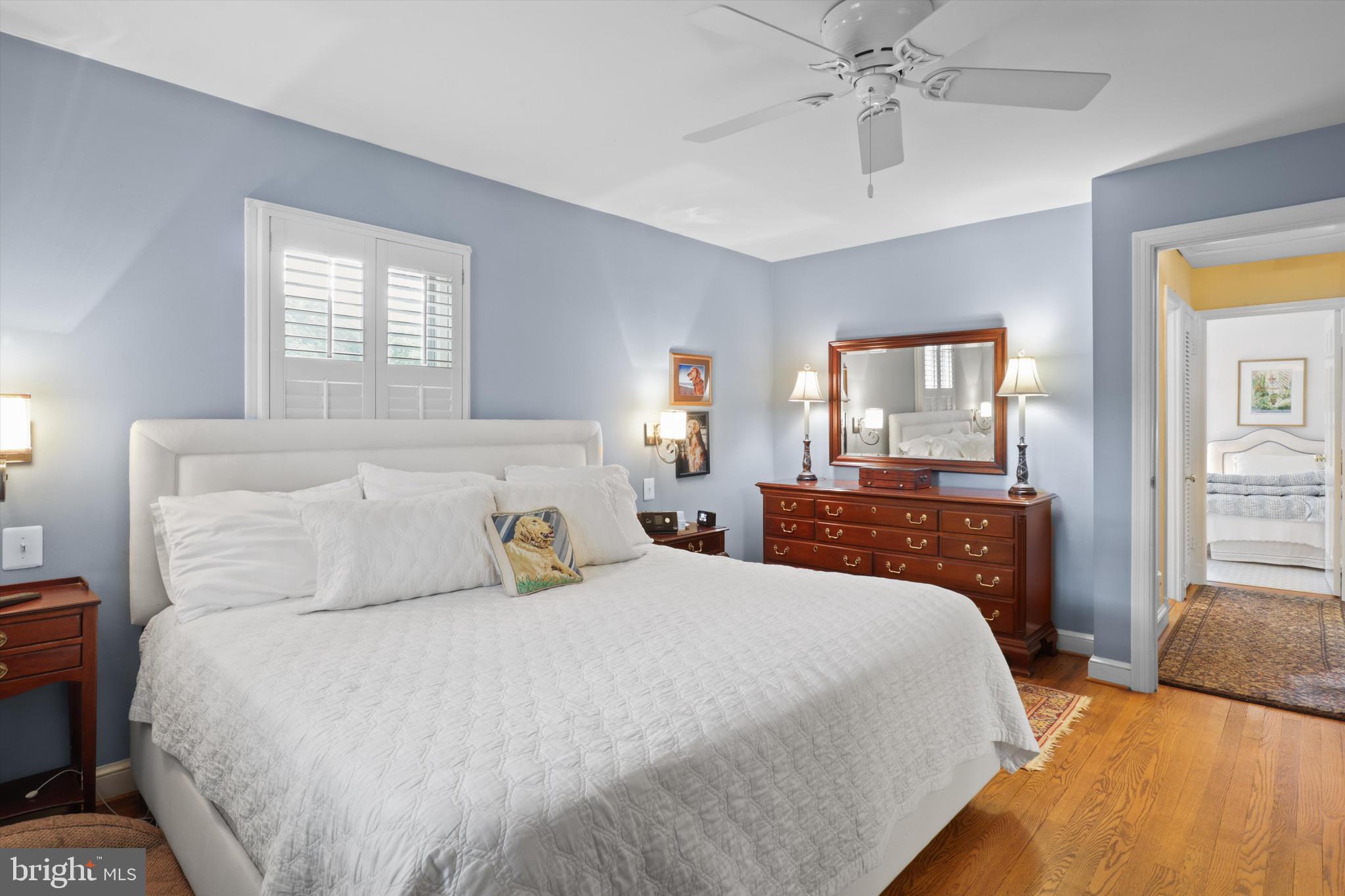 2905 Dartmouth Road Alexandria, VA 22314 - Photo 18 of 28 a bedroom with a large bed and a chandelier
