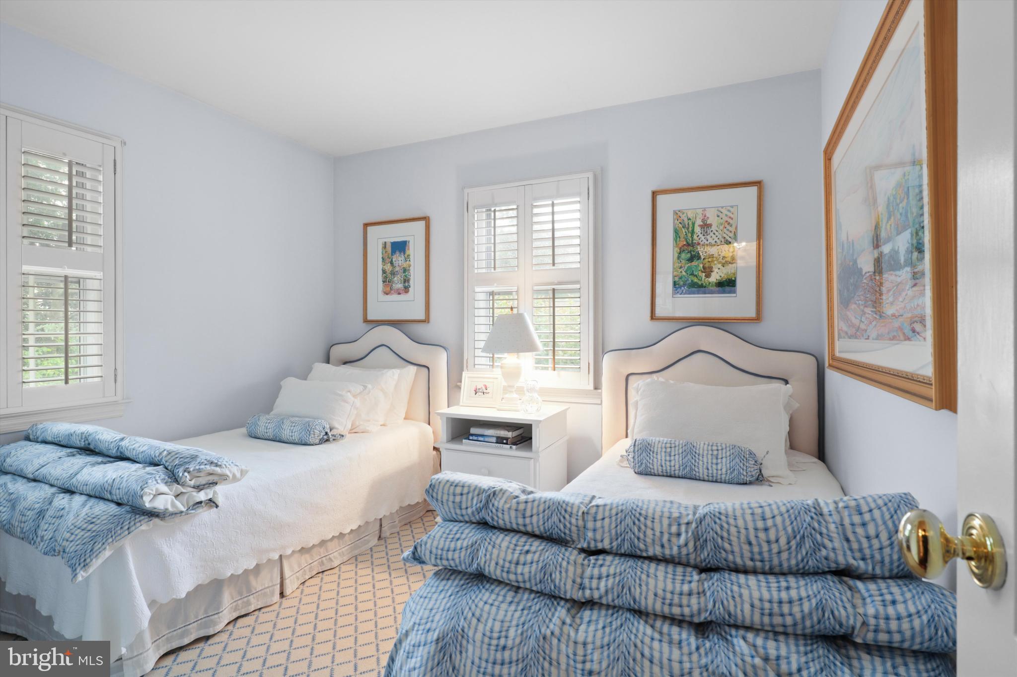 2905 Dartmouth Road Alexandria, VA 22314 - Photo 24 of 28 a bedroom with a large bed and a couch