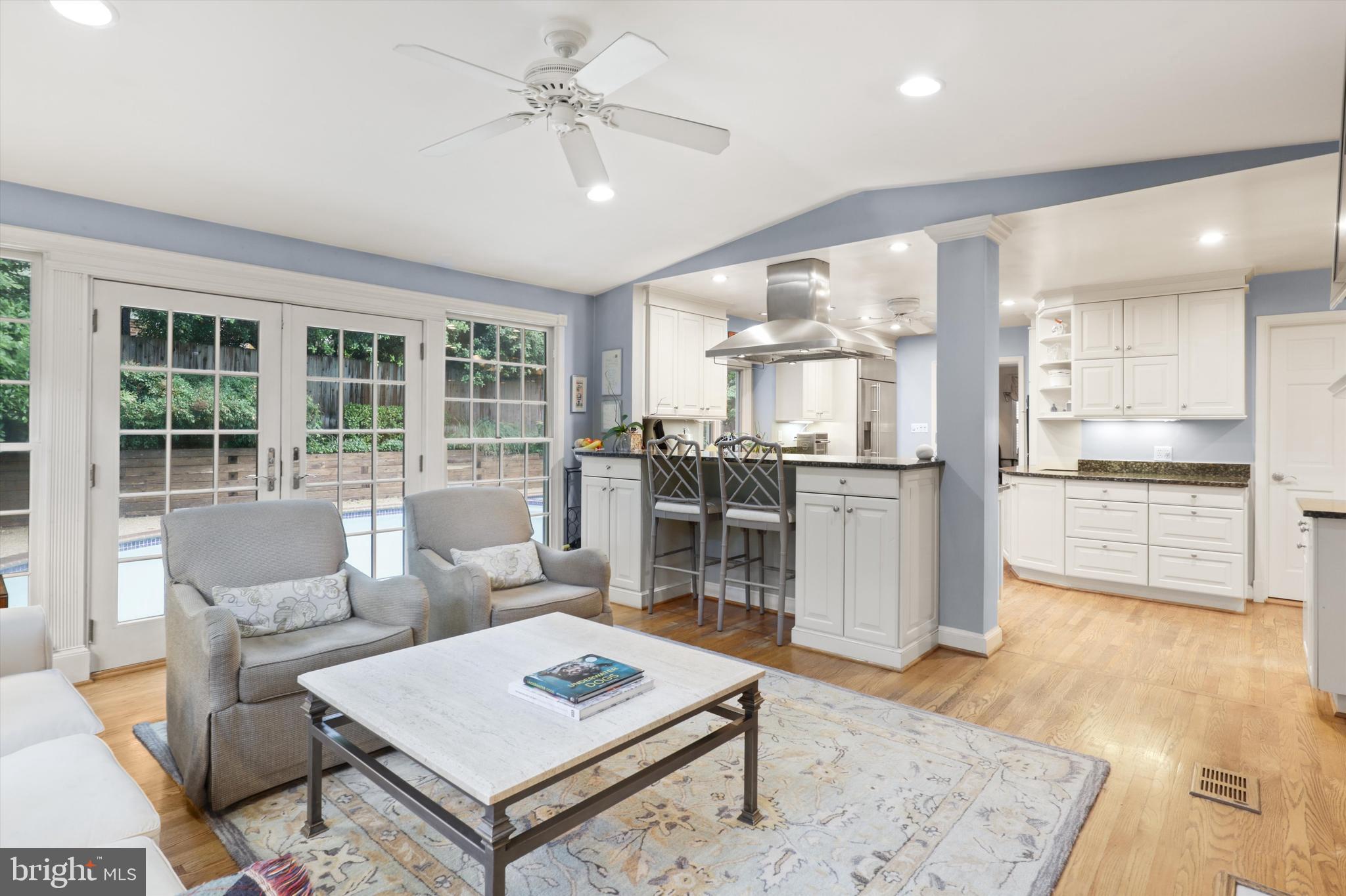 2905 Dartmouth Road Alexandria, VA 22314 - Photo 3 of 28 a living room with stainless steel appliances furniture a rug and a kitchen view