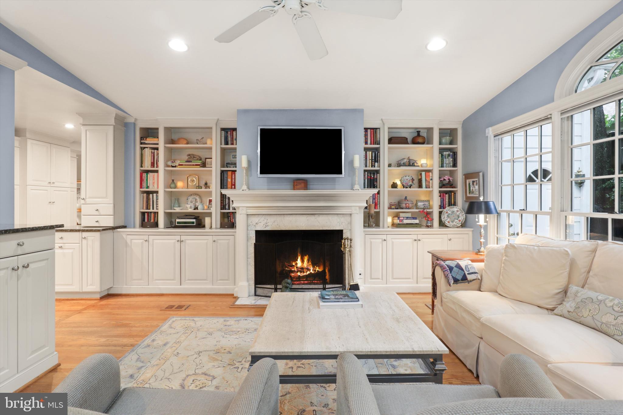 2905 Dartmouth Road Alexandria, VA 22314 - Photo 4 of 28 a living room with furniture a flat screen tv and a fireplace