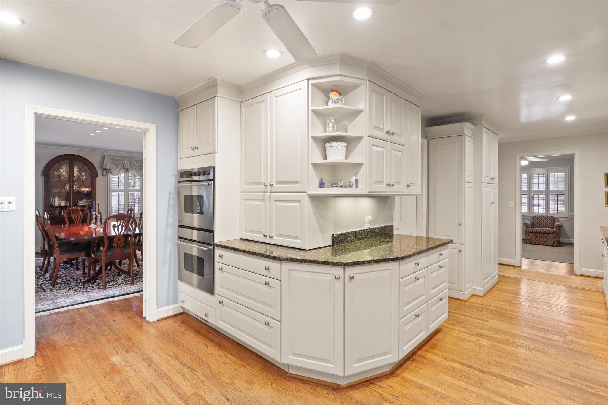 2905 Dartmouth Road Alexandria, VA 22314 - Photo 7 of 28 a kitchen with stainless steel appliances granite countertop a stove and a refrigerator