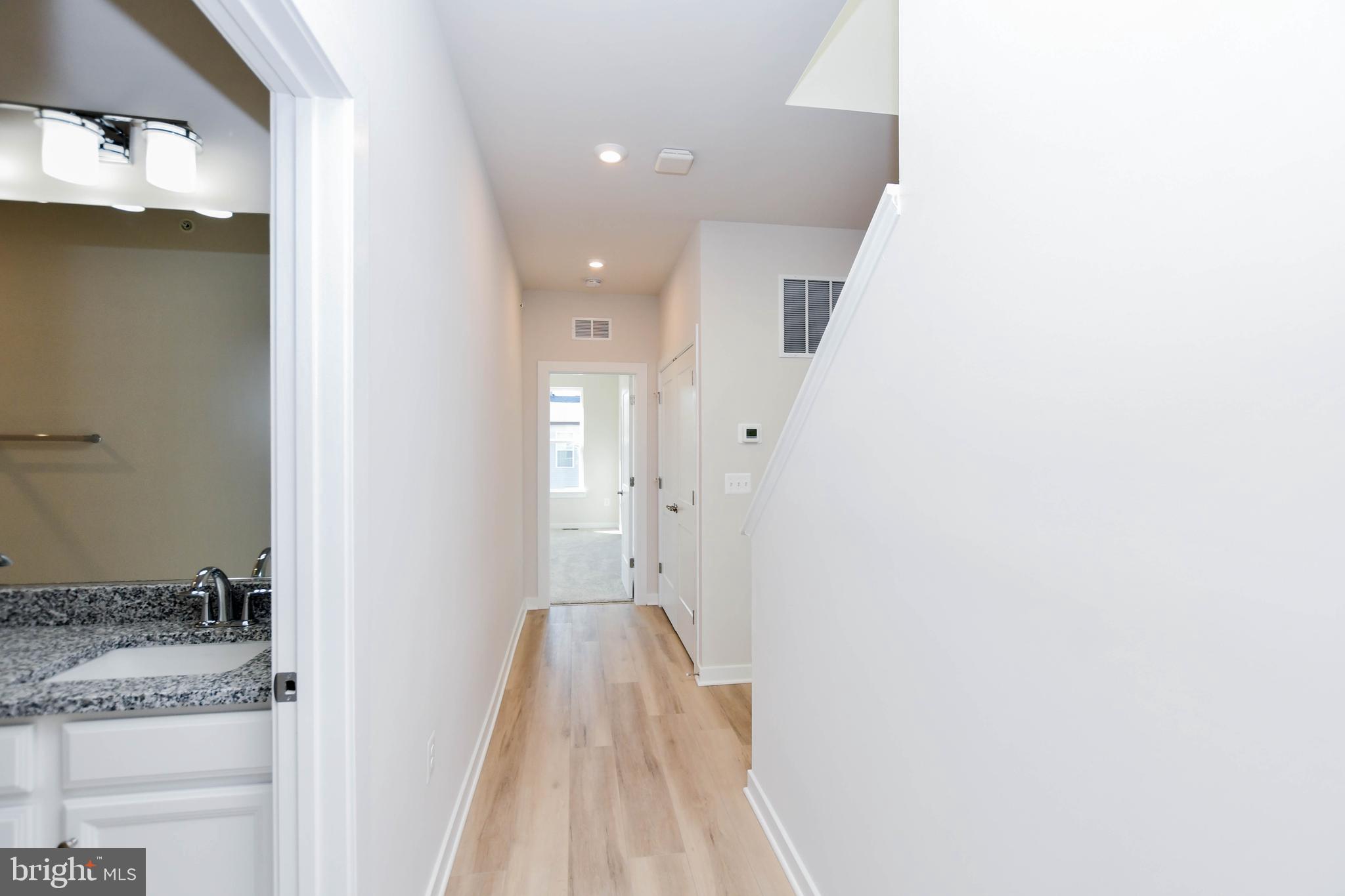 44502 Wolfhound Square Ashburn, VA 20147 - Photo 18 of 100 a bathroom with a sink and a mirror