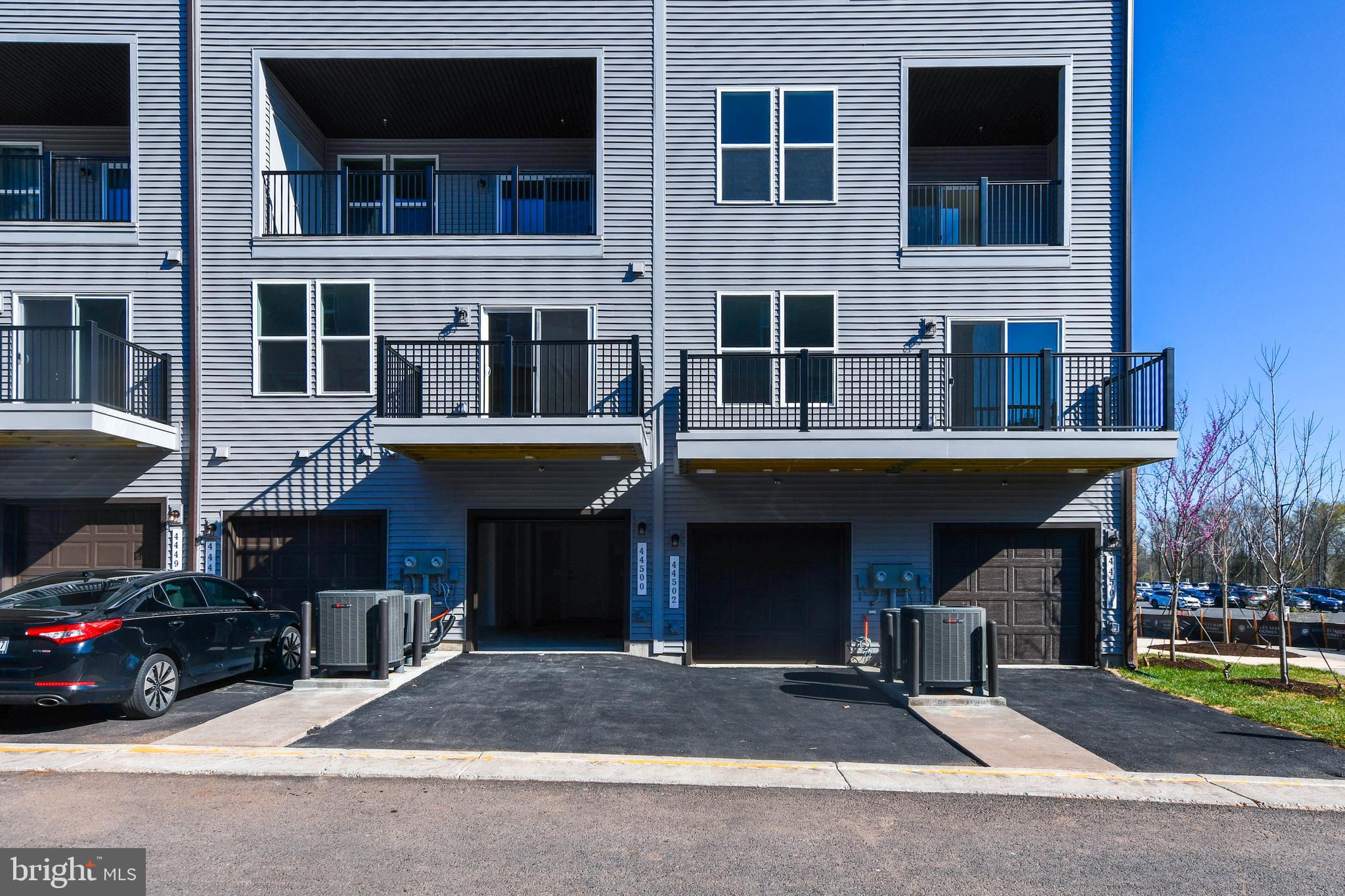 44502 Wolfhound Square Ashburn, VA 20147 - Photo 2 of 100 a view of a building with many windows