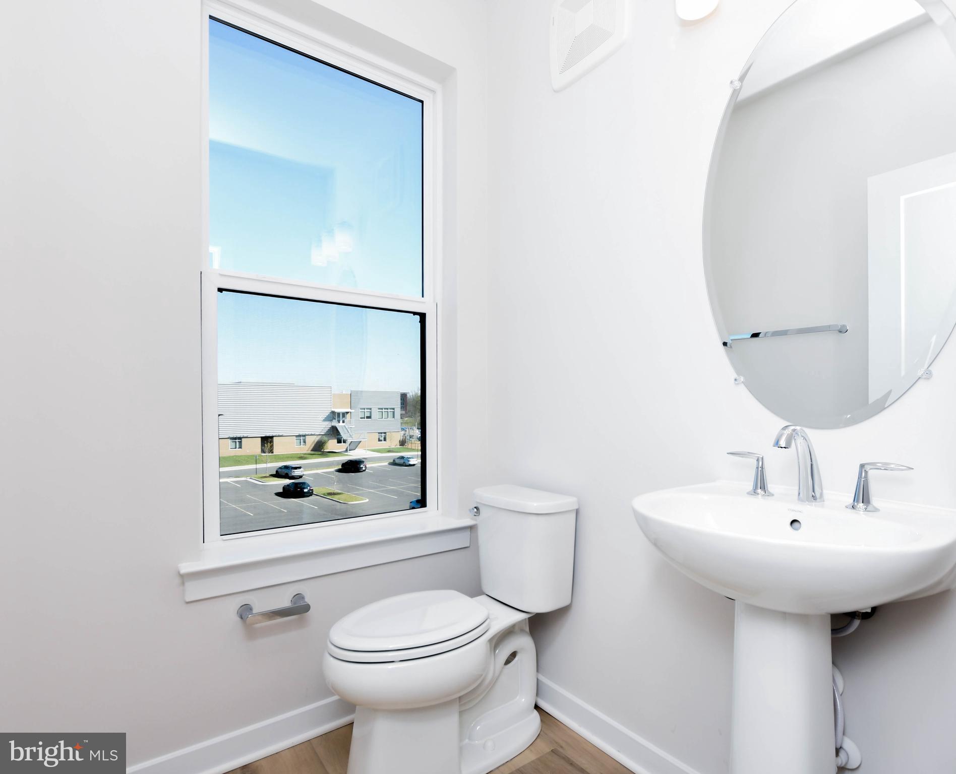 44502 Wolfhound Square Ashburn, VA 20147 - Photo 45 of 100 a bathroom with a sink and a mirror