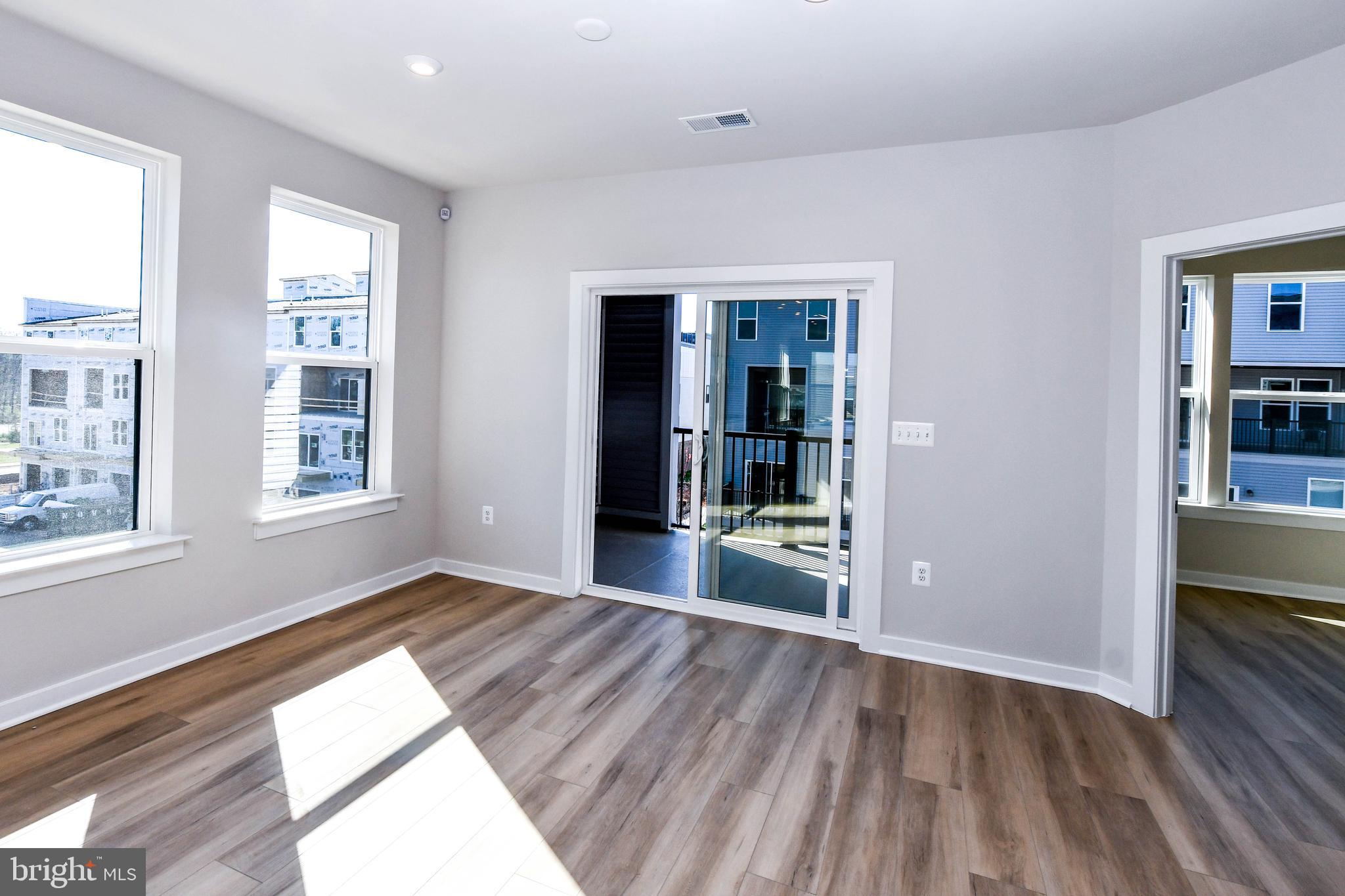 44502 Wolfhound Square Ashburn, VA 20147 - Photo 68 of 100 wooden floor in an empty room with a window