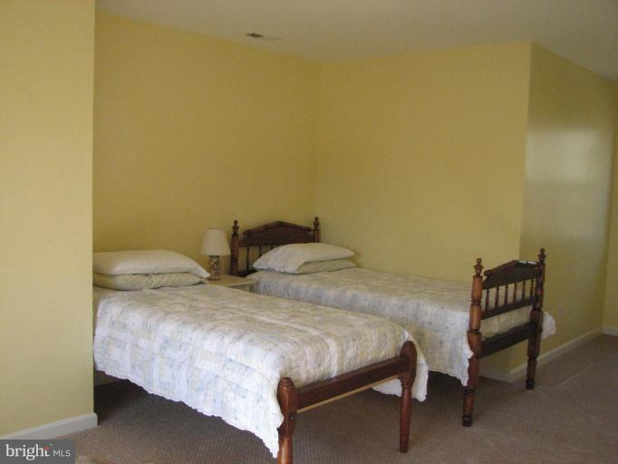 11522 Wrangler Road Lusby, MD 20657 - Photo 13 of 17 upper level large bedroom