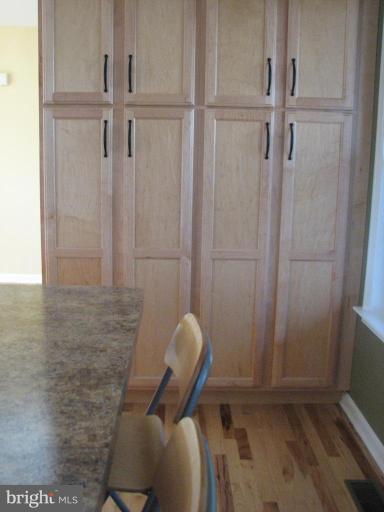 11522 Wrangler Road Lusby, MD 20657 - Photo 5 of 17 kitchen wall of cabinets