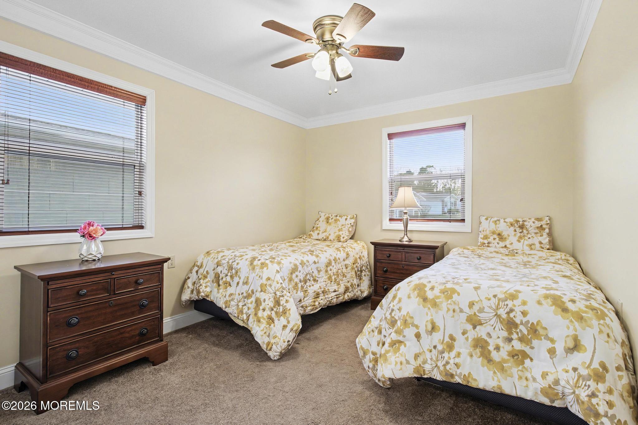 203 Blake Circle Brick, NJ 08724 - Photo 22 of 40 a bedroom with two beds and a dresser