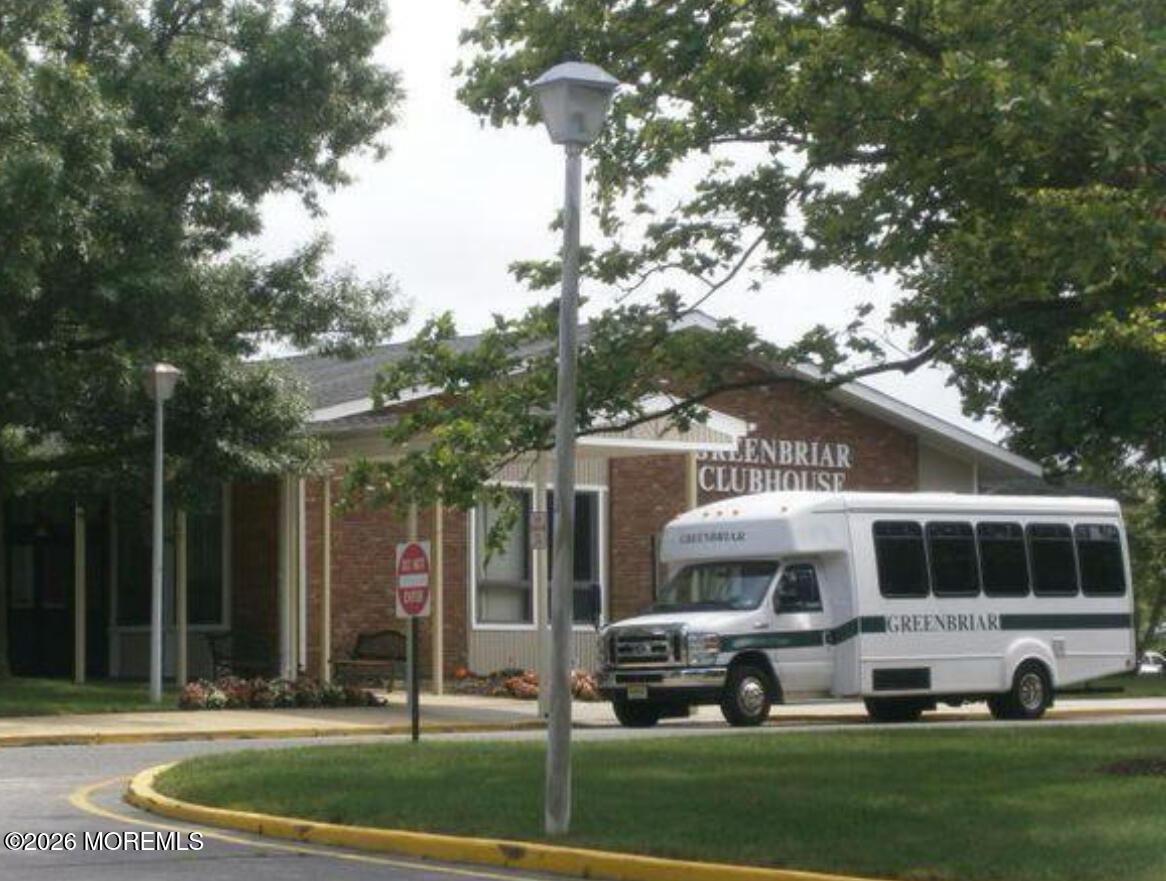 203 Blake Circle Brick, NJ 08724 - Photo 34 of 40 a front view of a house with a yard