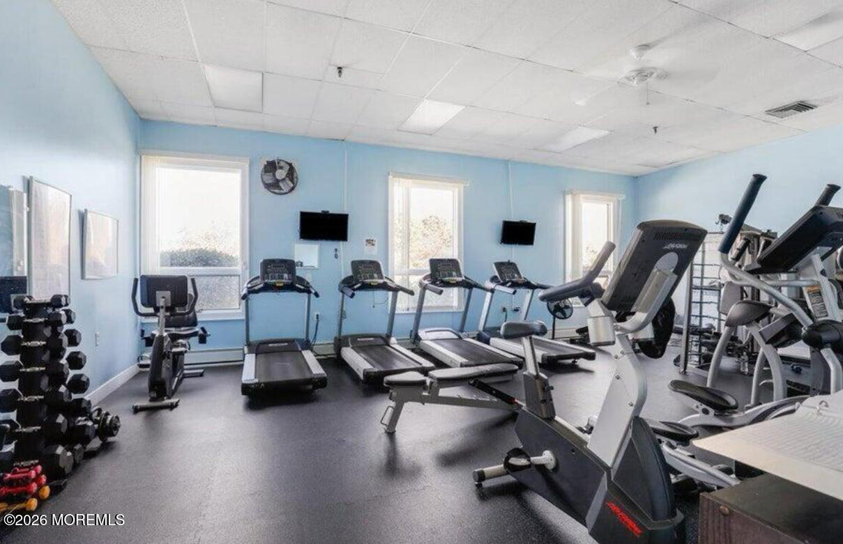 203 Blake Circle Brick, NJ 08724 - Photo 35 of 40 a view of a room with gym equipment