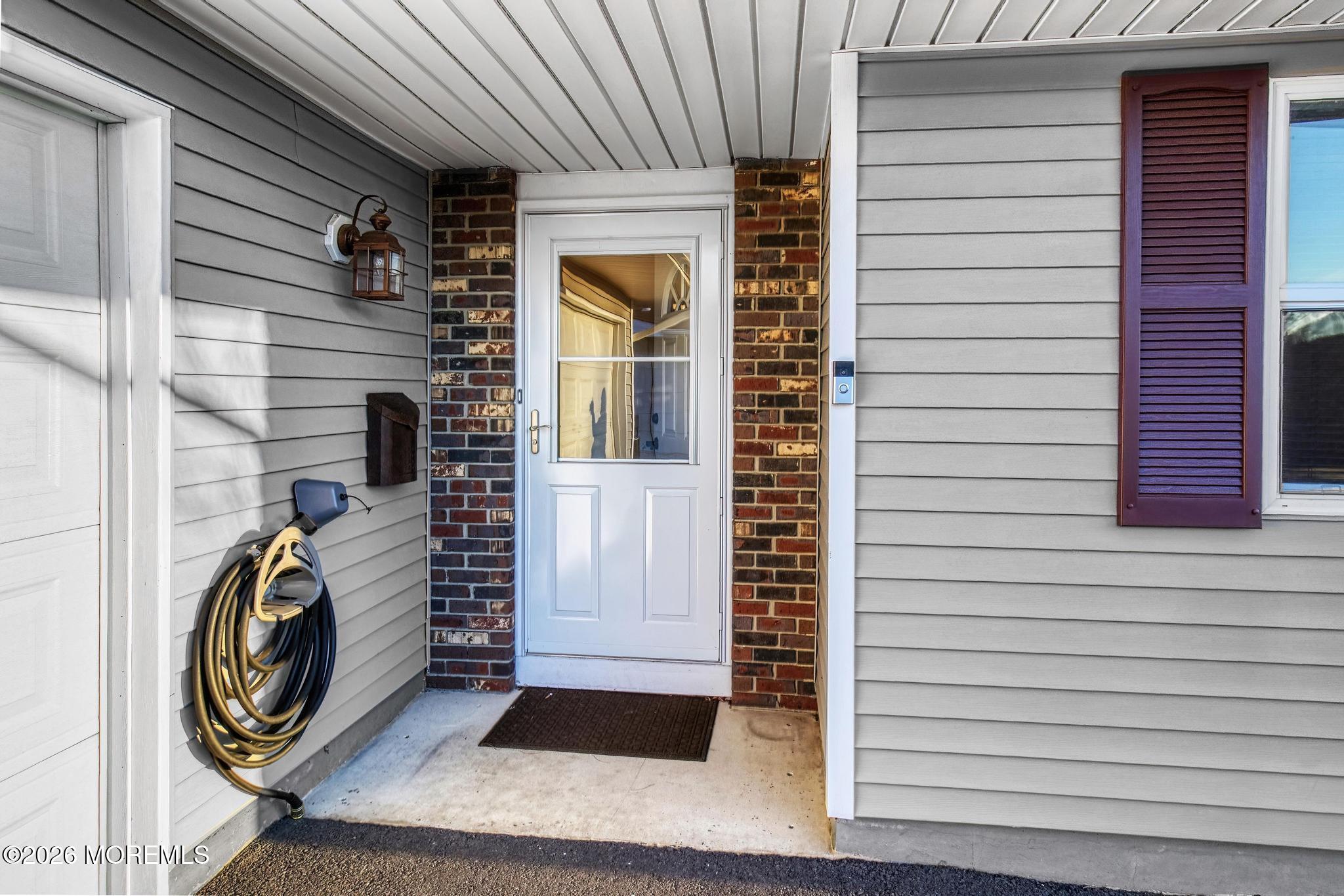 203 Blake Circle Brick, NJ 08724 - Photo 8 of 40 a view of front door and porch