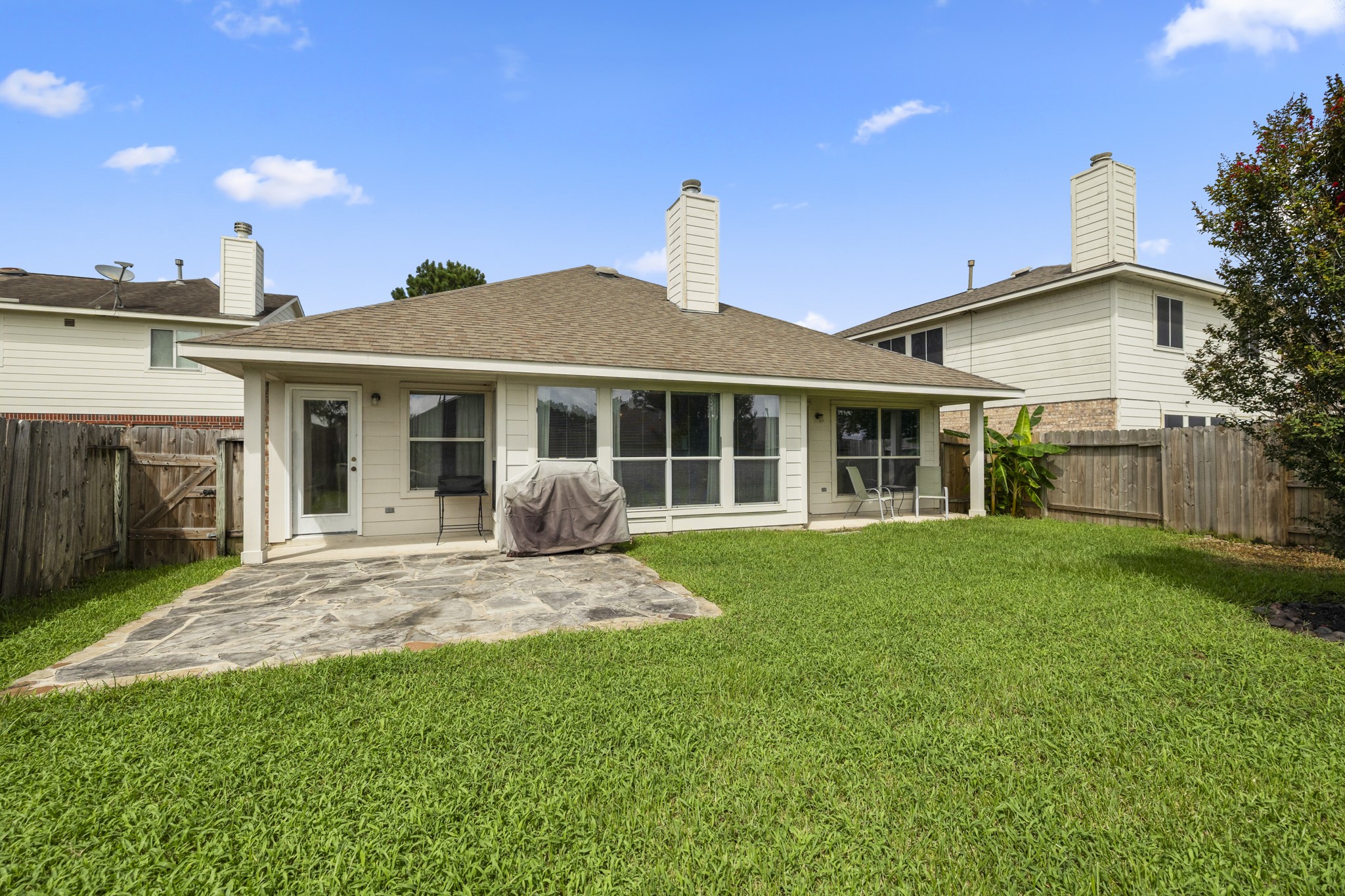 3422 Falcon Trail Court Spring, TX 77373 - Photo 29 of 35 a front view of a house with a garden