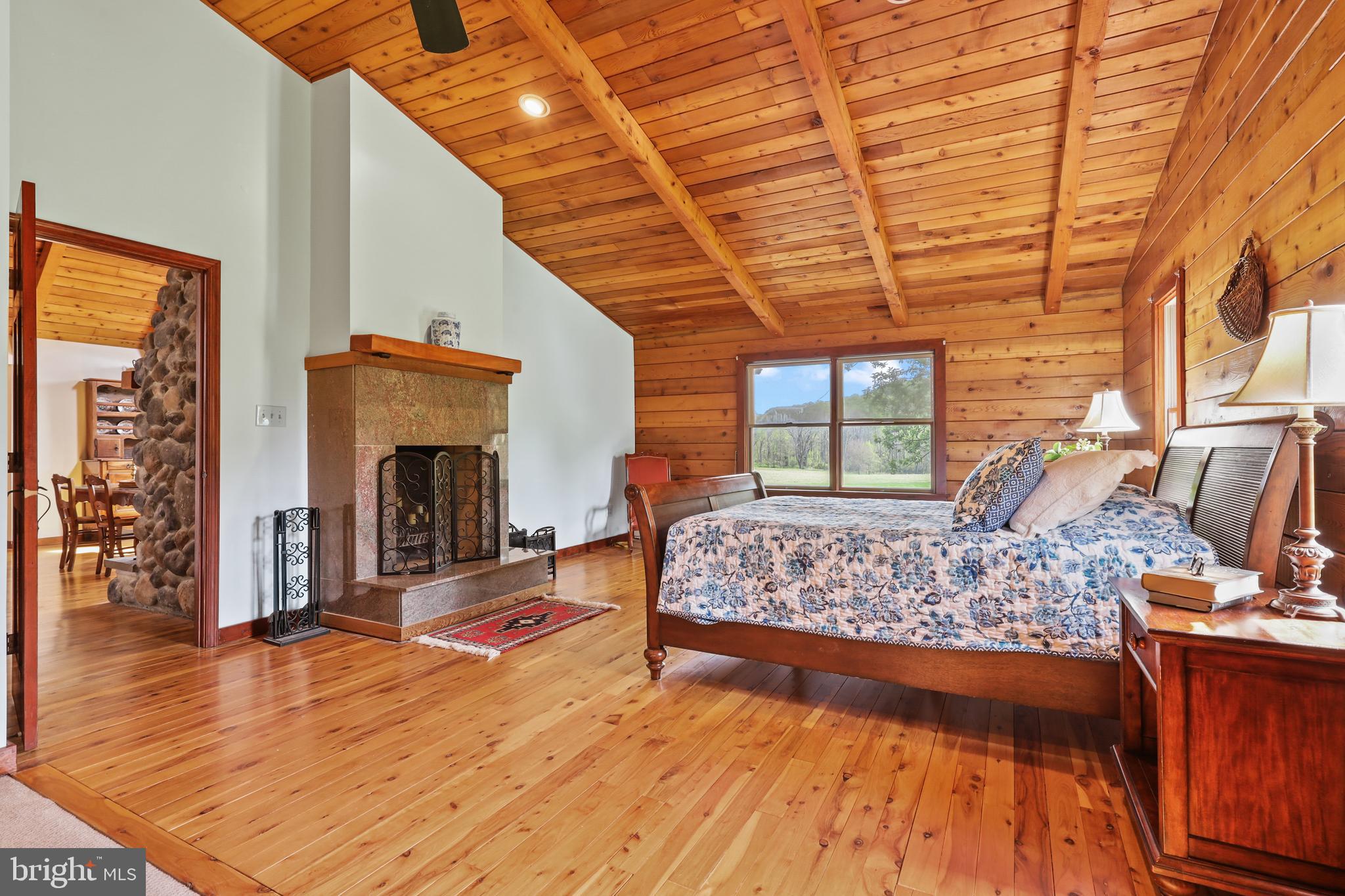 13021 Beaver Dam Road Cockeysville, MD 21030 - Photo 26 of 57 Primary bedroom suite with wood burning fireplace