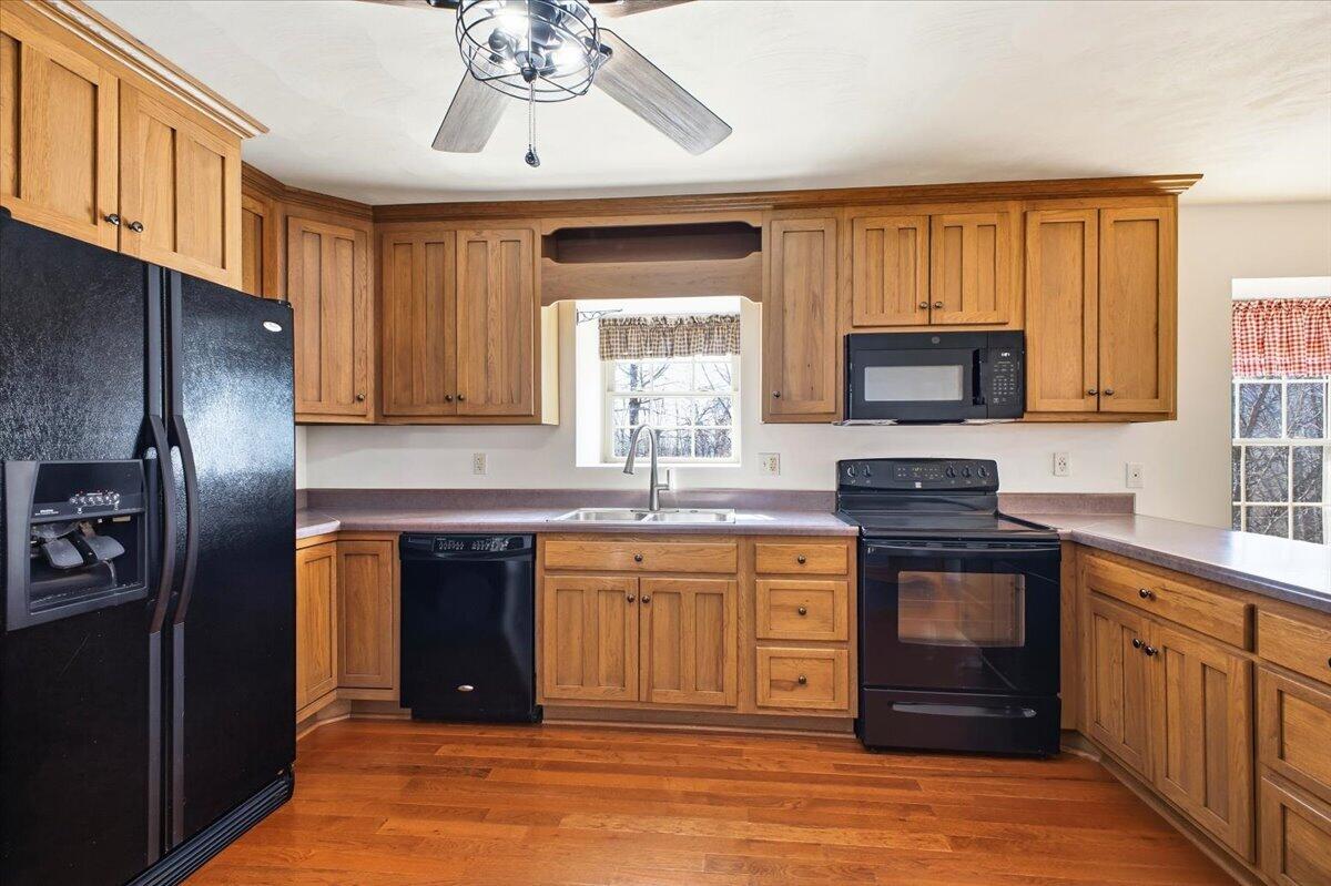 3282 Absalom Smith Road Salem, VA 24153 - Photo 11 of 59 a kitchen with stainless steel appliances granite countertop a stove sink and refrigerator