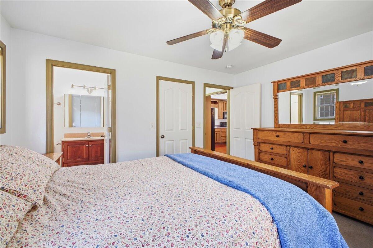 3282 Absalom Smith Road Salem, VA 24153 - Photo 21 of 59 a bedroom with a bed and a dresser