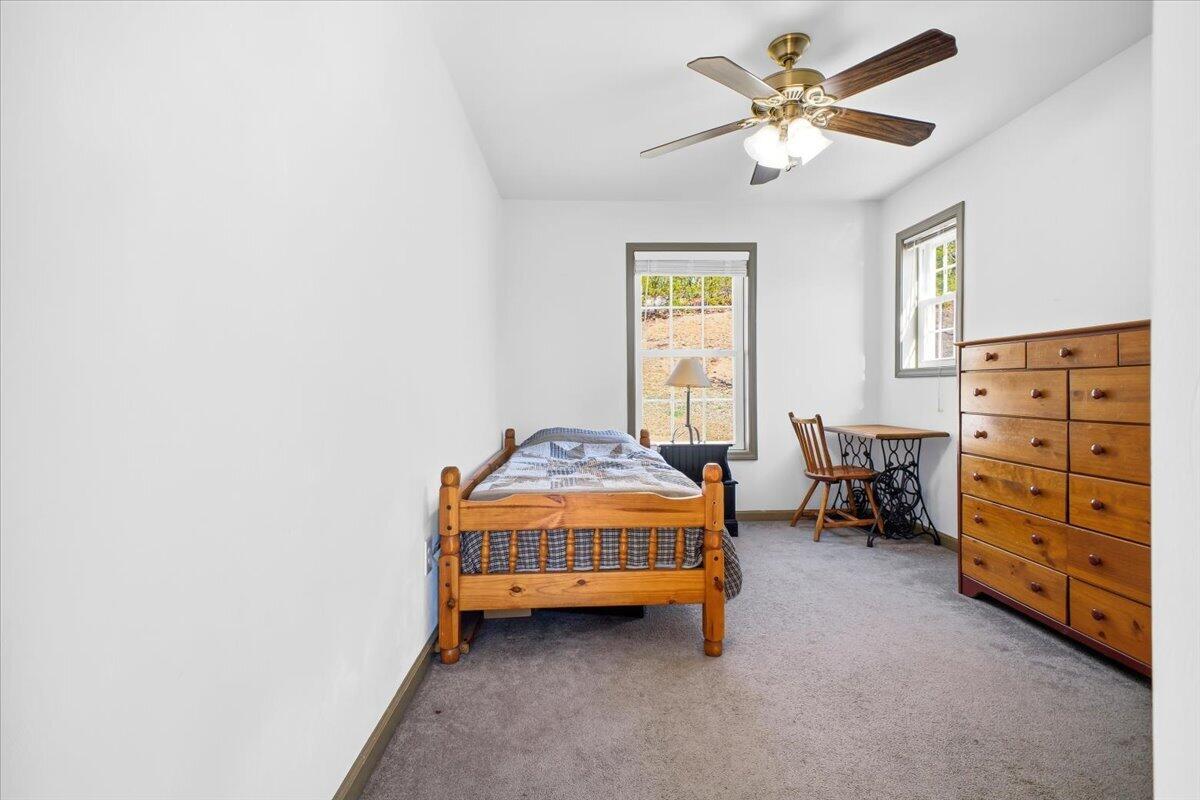 3282 Absalom Smith Road Salem, VA 24153 - Photo 29 of 59 a bedroom with a bed and a window