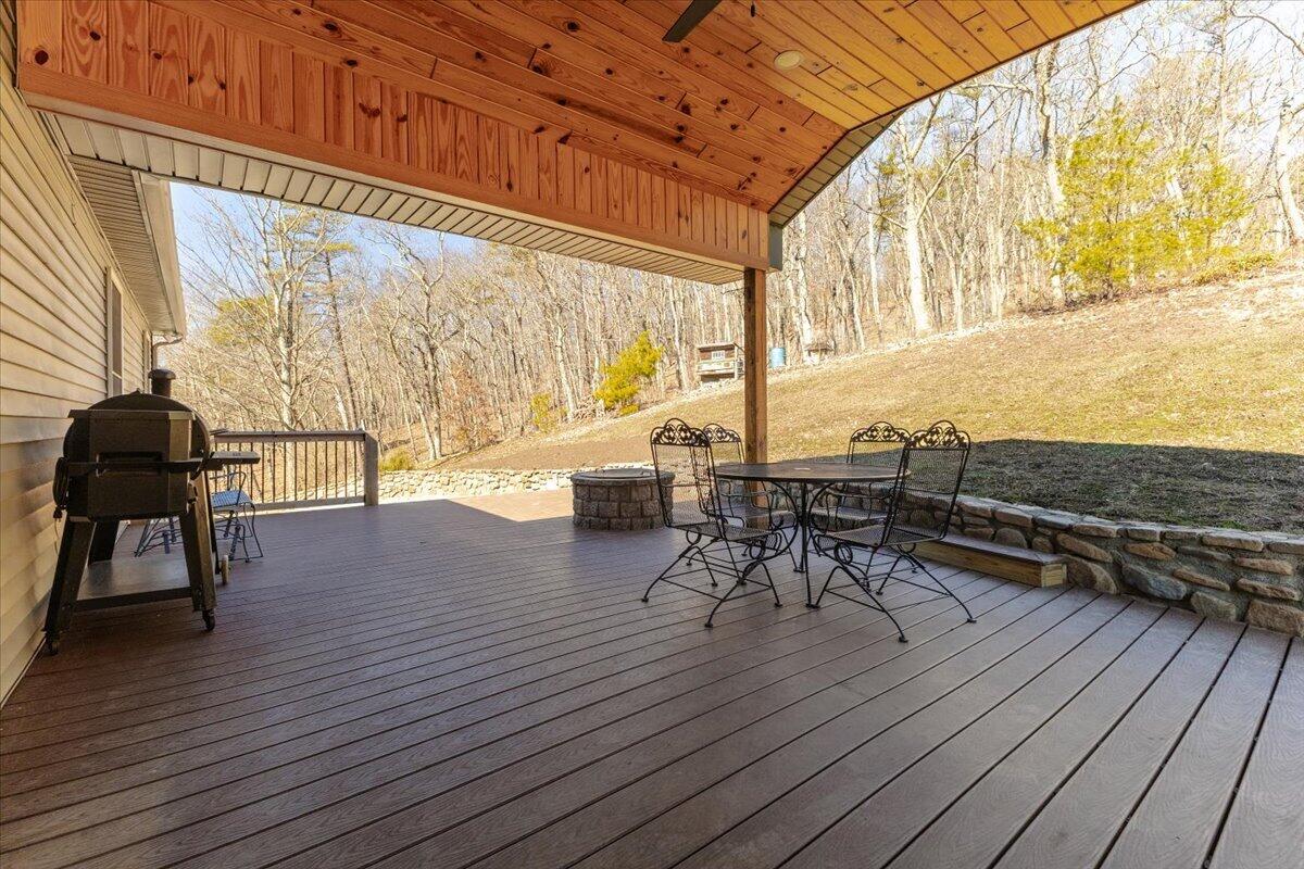 3282 Absalom Smith Road Salem, VA 24153 - Photo 37 of 59 a living room with wooden floors and a table
