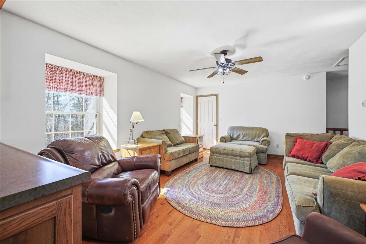 3282 Absalom Smith Road Salem, VA 24153 - Photo 9 of 59 a living room with furniture ceiling fan and a window