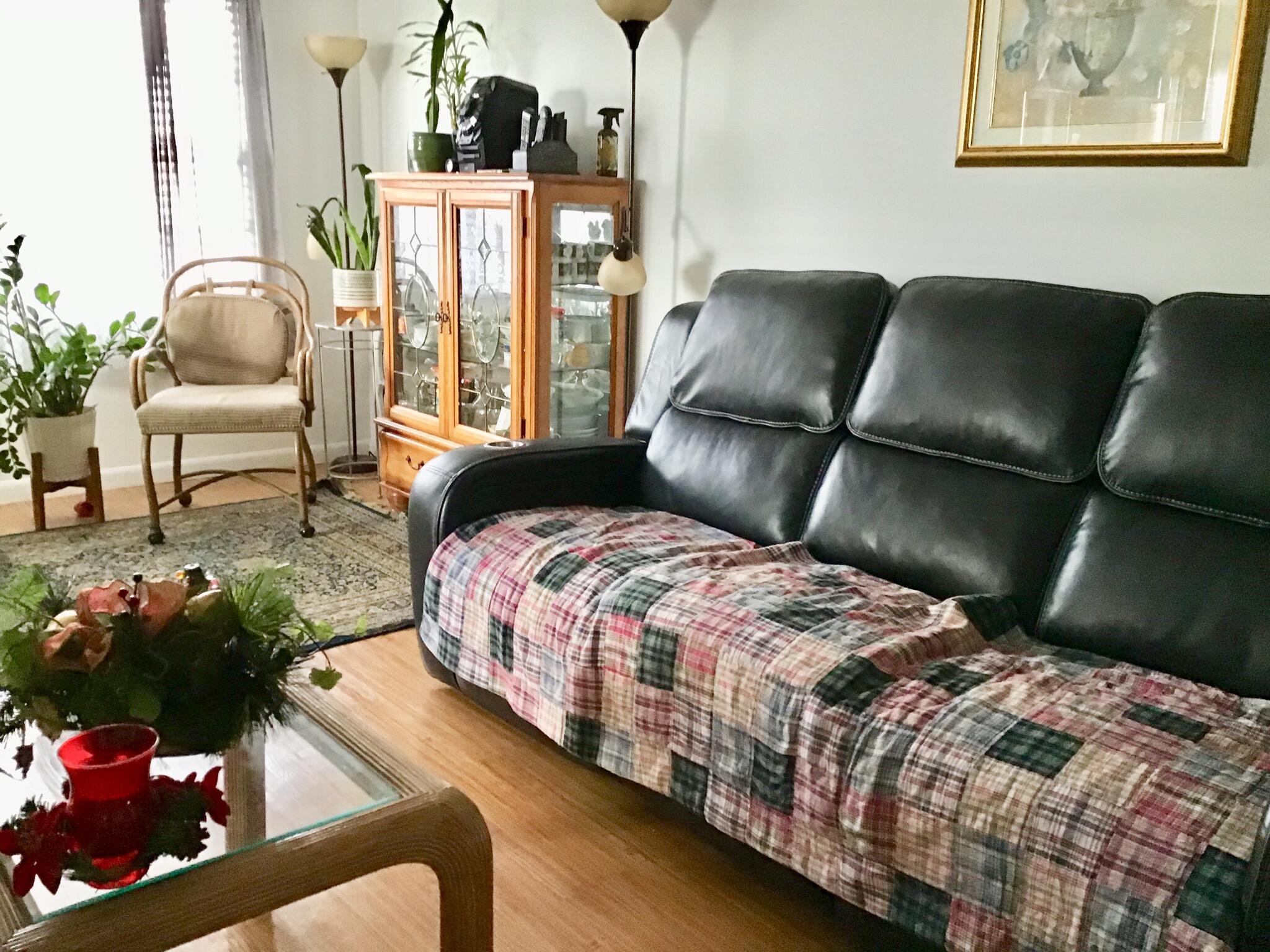 84 Brighton B Boca Raton, FL 33434 - Photo 11 of 35 a bedroom with a bed and wooden floor