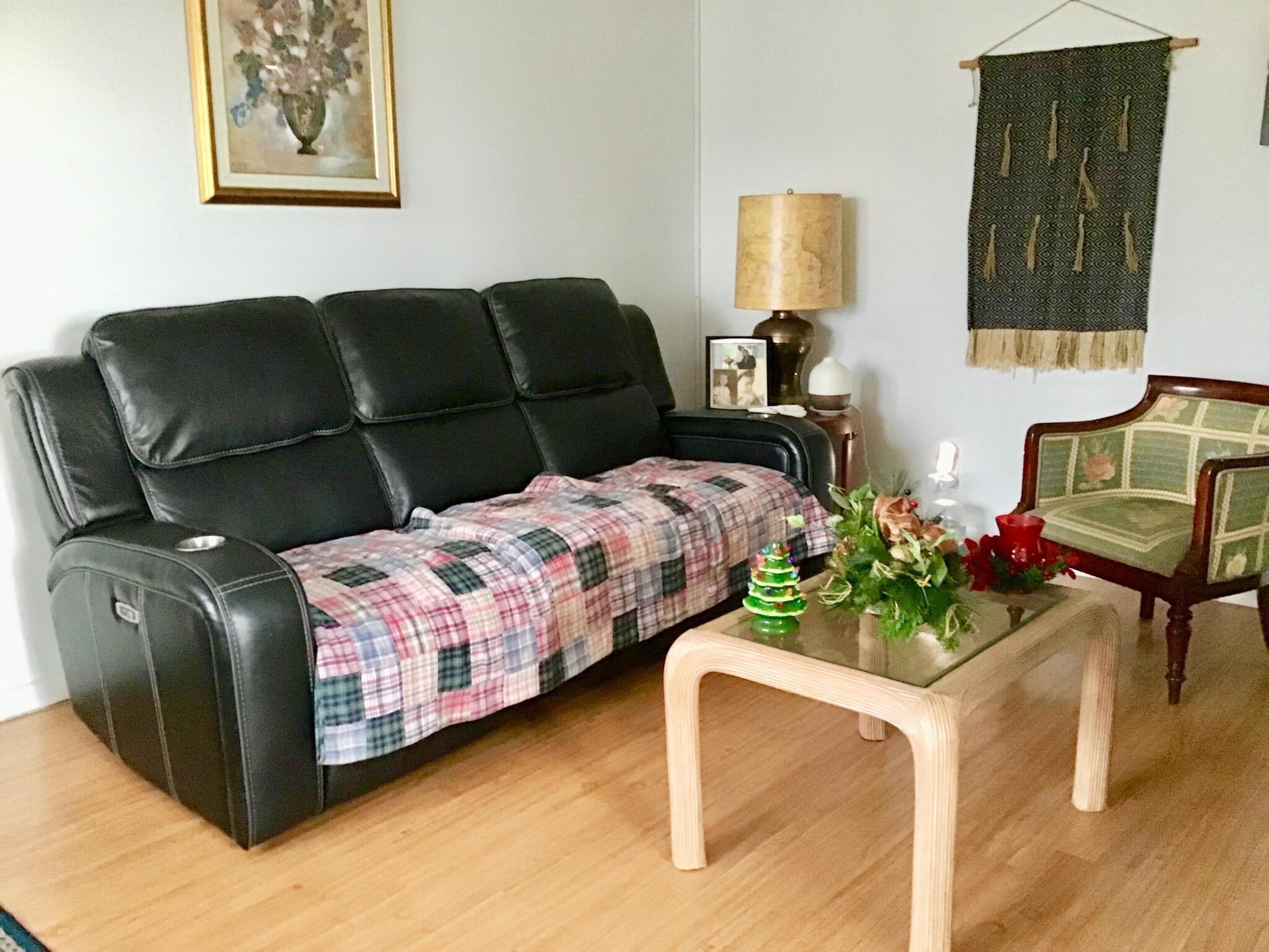 84 Brighton B Boca Raton, FL 33434 - Photo 9 of 35 a living room with furniture and wooden floor