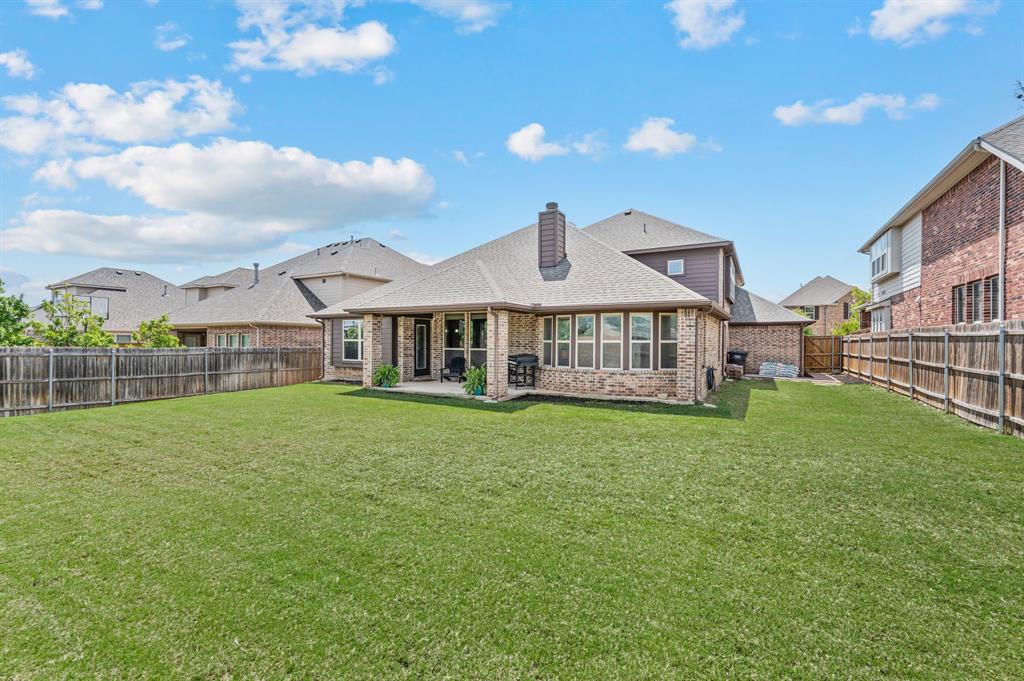 5209 Edgebrook Way Fort Worth, TX 76244 - Photo 28 of 33 a view of a big house with a big yard and large trees