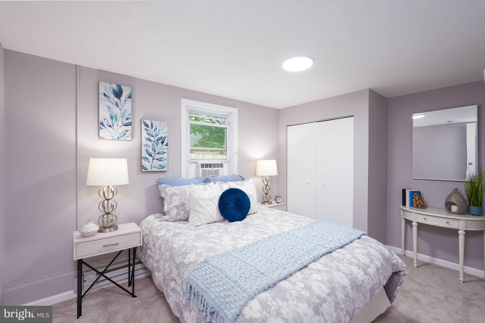 11310 Norris Drive Silver Spring, MD 20902 - Photo 23 of 41 a bedroom with a bed and a window