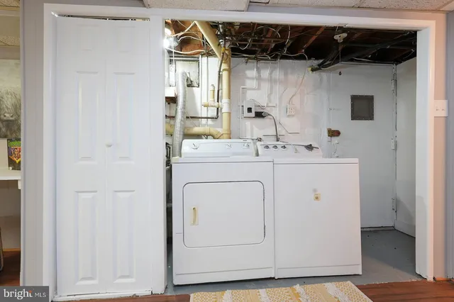 a utility room with dryer and washer