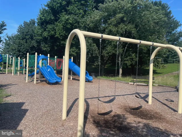 a view of a park with slide