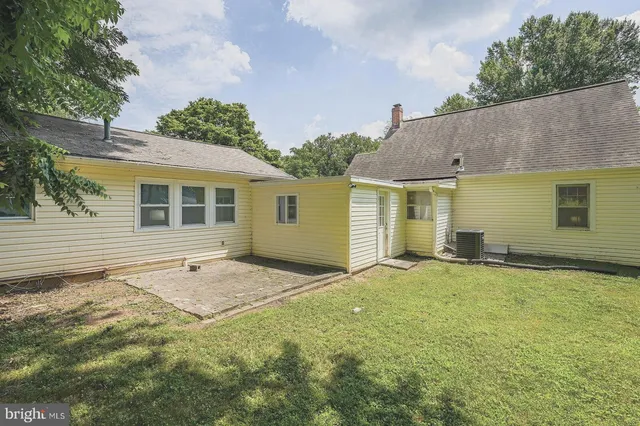 a house with yard in front of it