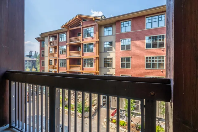 a view of a large brick building from a window