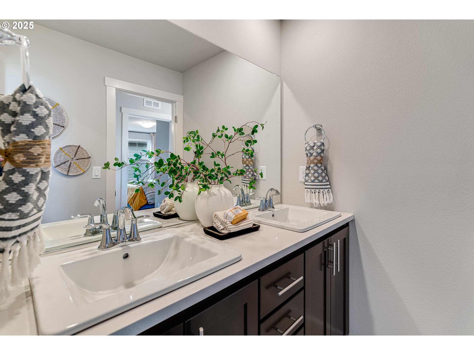 931 Legacy Street Eugene, OR 97402 - Photo 18 of 21 a bathroom with a sink and a mirror