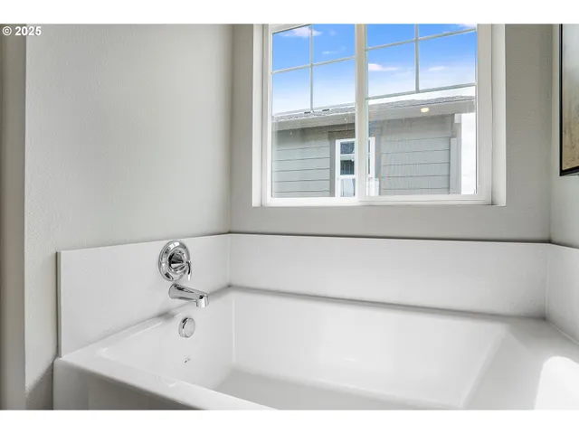 a bathroom with a bathtub