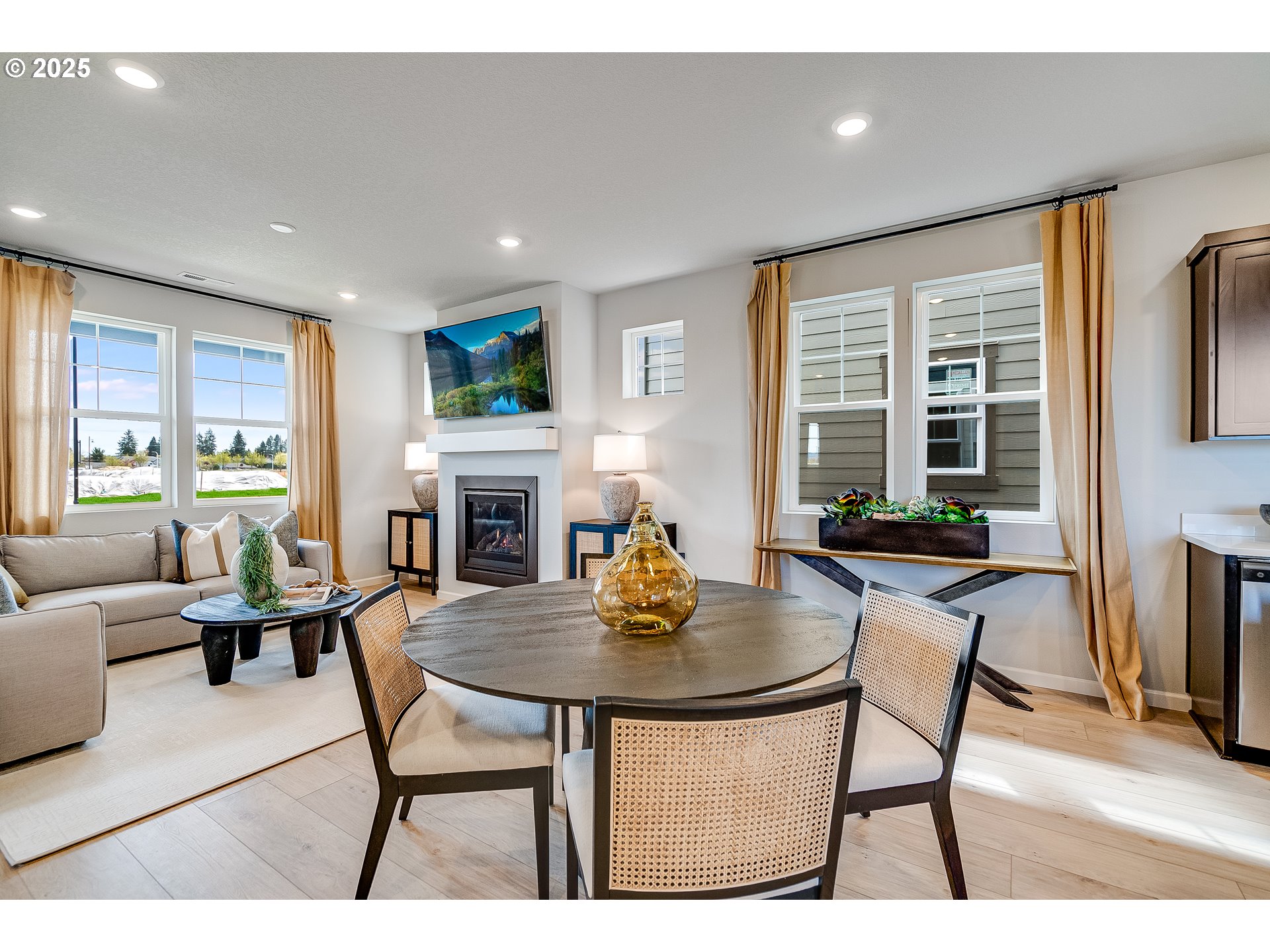 931 Legacy Street Eugene, OR 97402 - Photo 5 of 21 a living room with fireplace furniture and a table