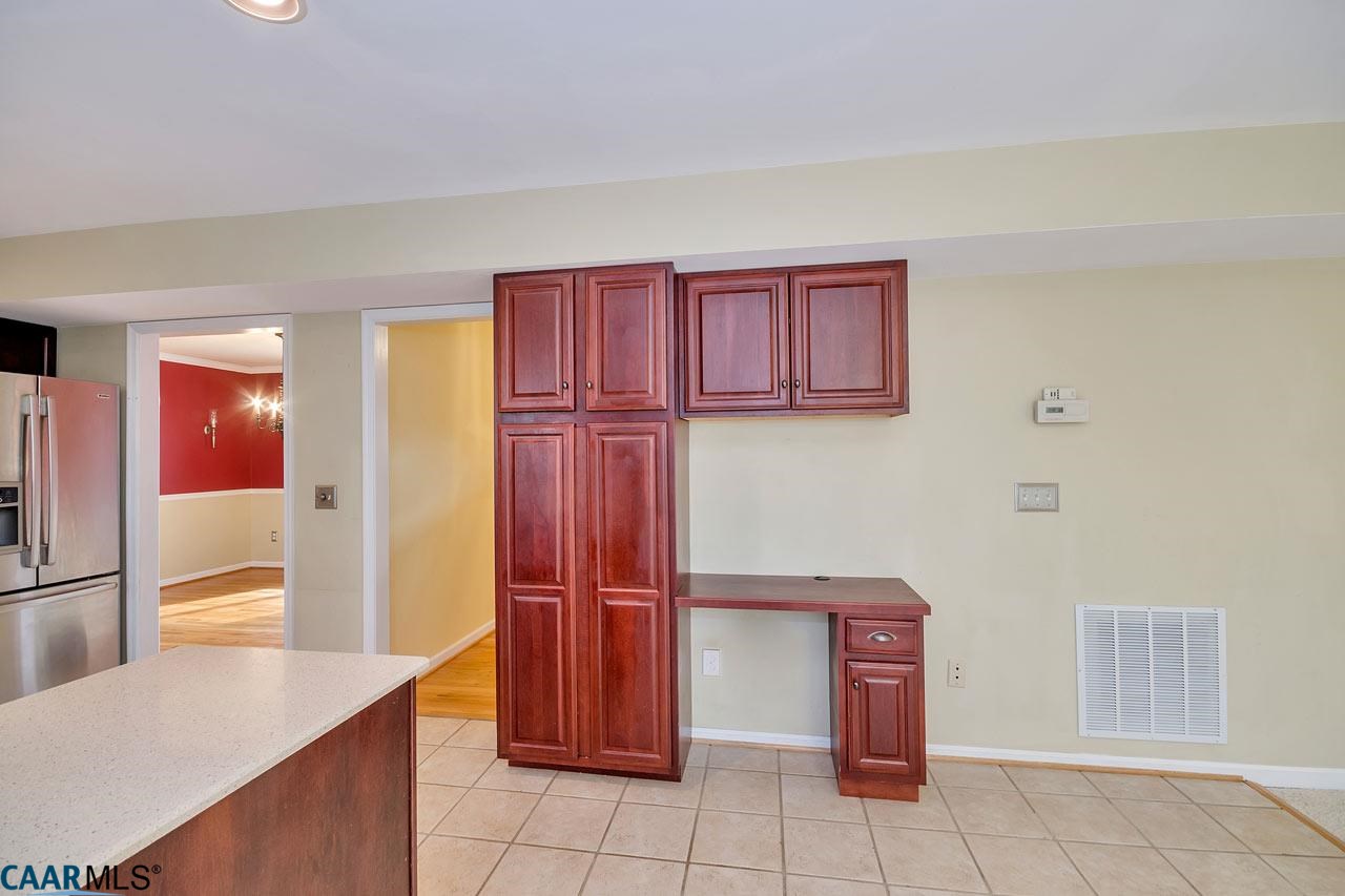 200 Doe Drive Ruckersville, VA 22968 - Photo 11 of 22 a kitchen with stainless steel appliances granite countertop a refrigerator and a sink