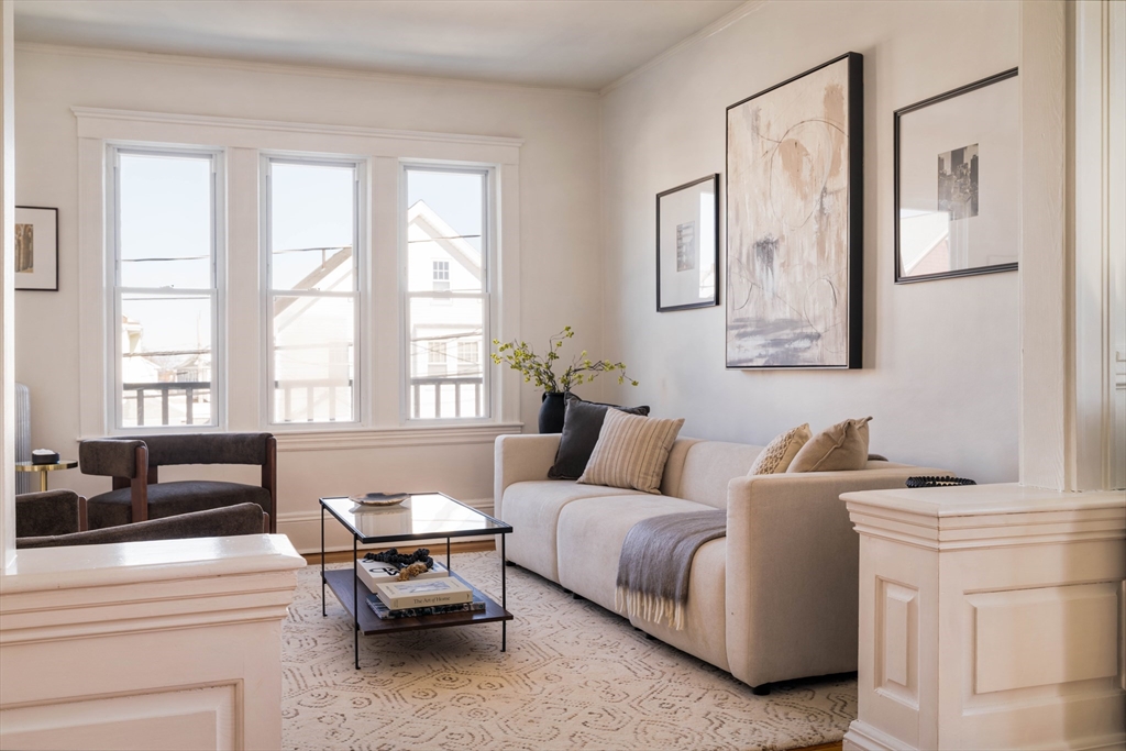 182 Maplewood Street, Unit 2 Watertown, MA 02472 - Photo 3 of 42 a living room with furniture and windows