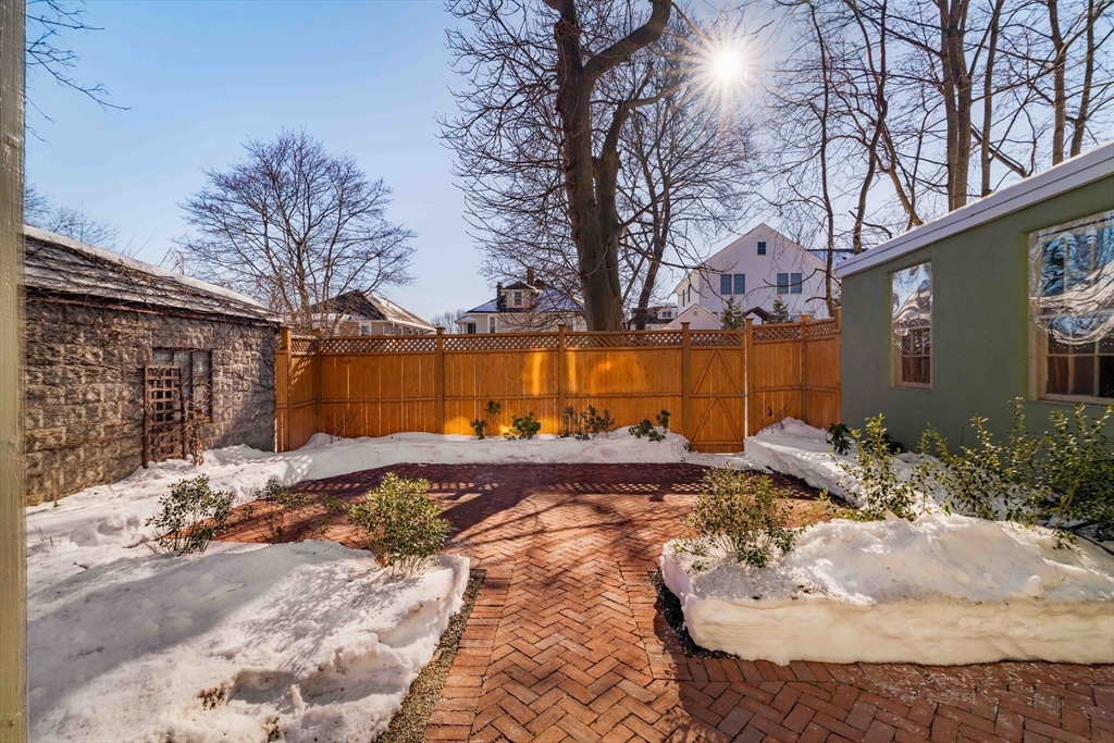 182 Maplewood Street, Unit 2 Watertown, MA 02472 - Photo 39 of 42 a view of a backyard of the house